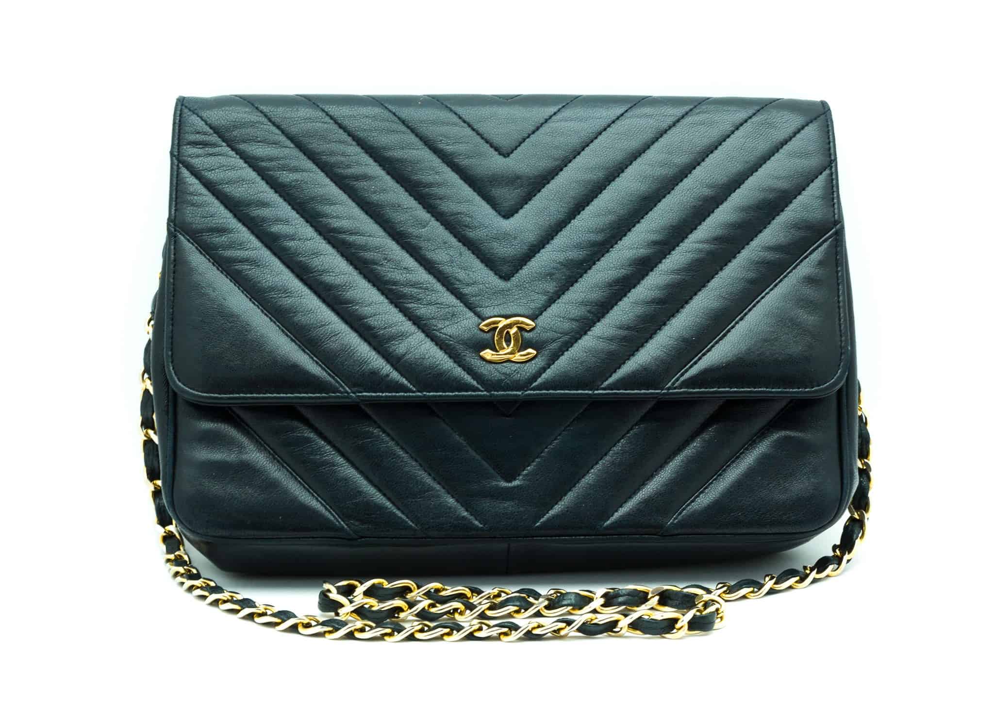 Sold at Auction: Chanel V Stitch CC Black Leather Flap Handbag