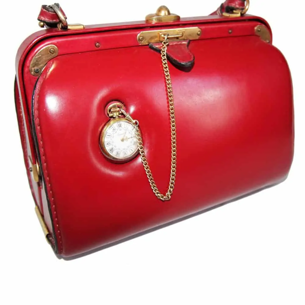 Wonderful Fernande Desgrange bag in box with a pocket watch.