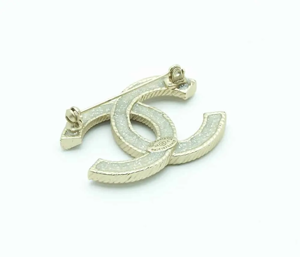 Chanel Twisted Brooch With Metals and Pearls ○ Labellov ○ Buy