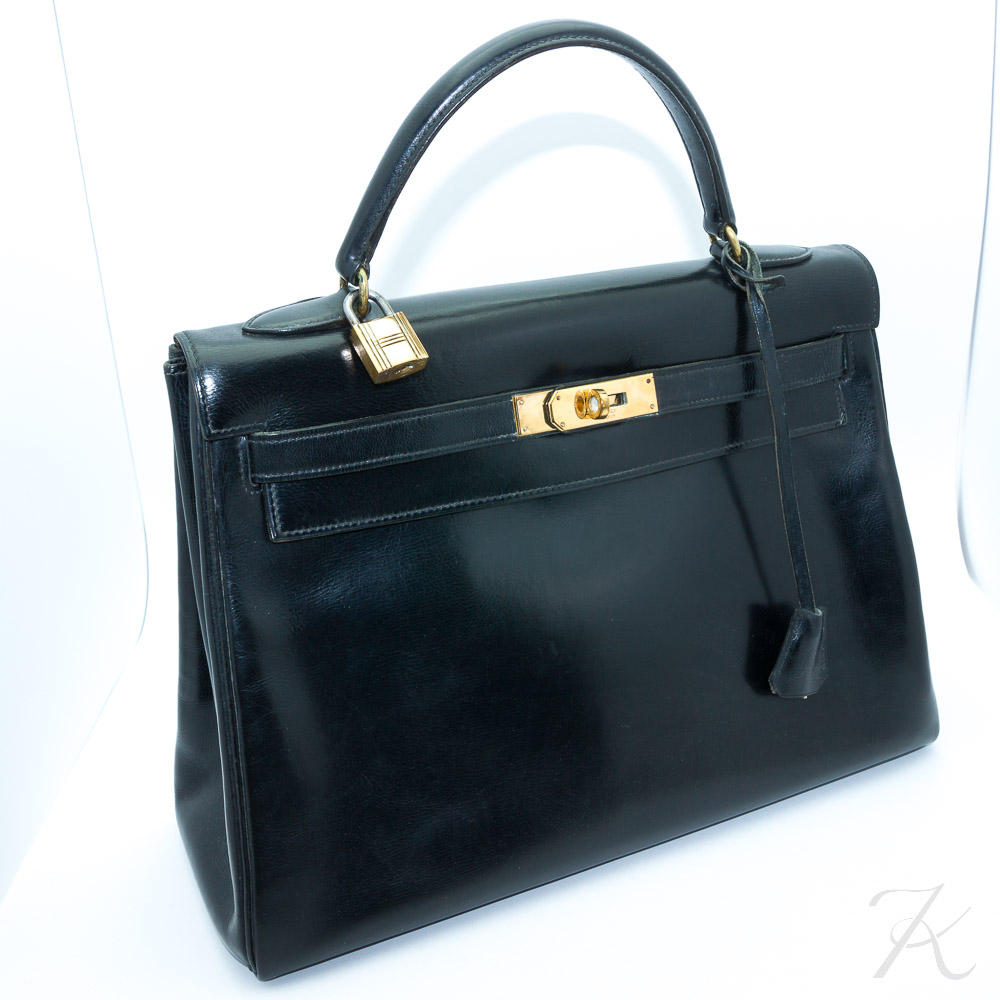 Sold at auction Vintage Black Box Leather Kelly Bag, Hermes Auction Number  2413 Lot Number 1