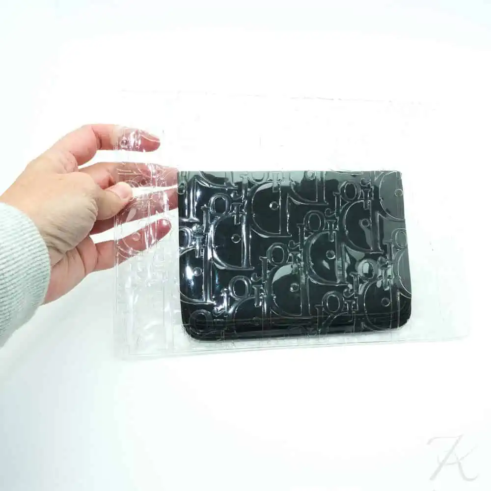 Dior vintage clear monogram clutch and wallet